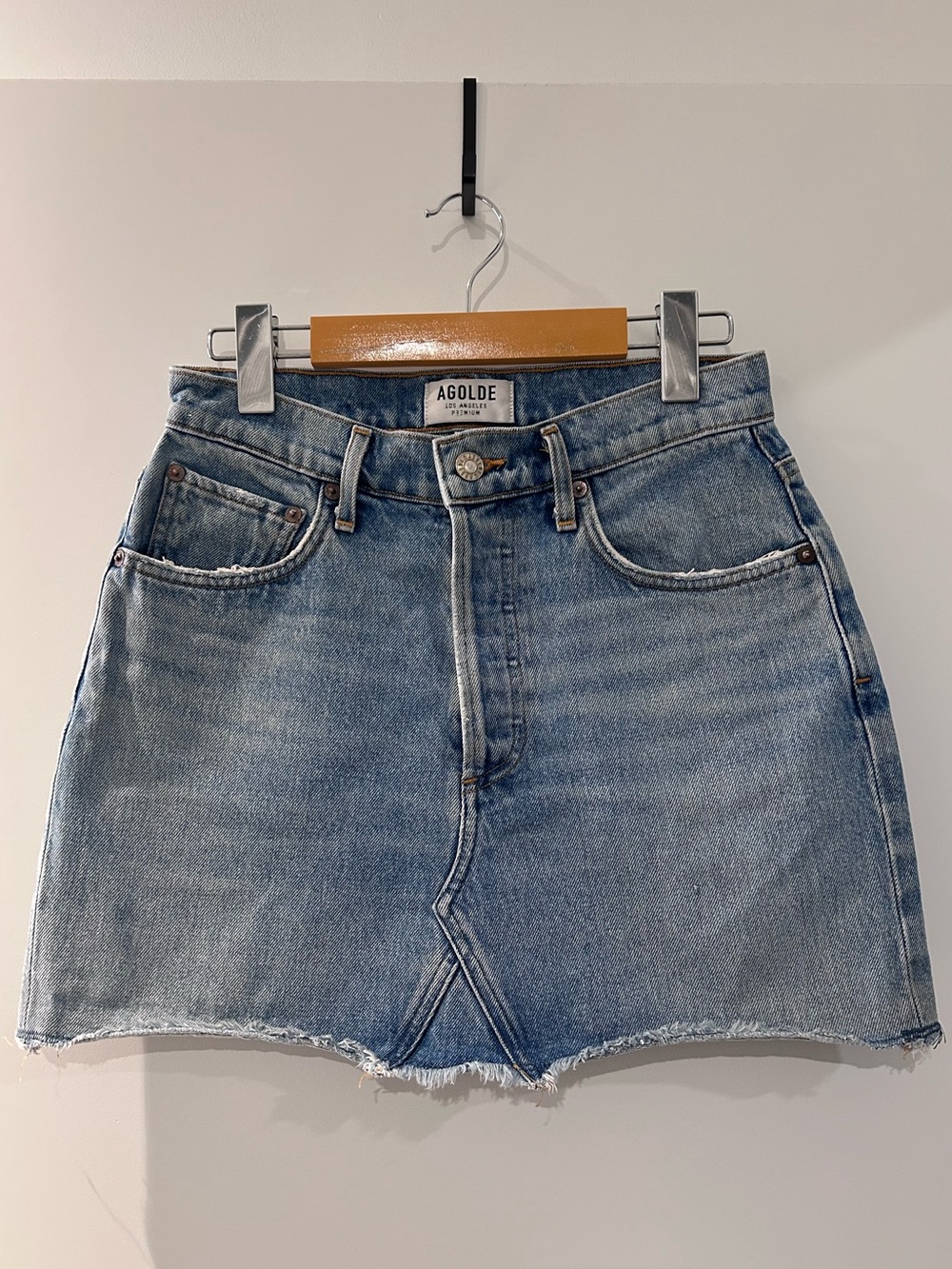 AGOLDE blue denim mini skirt with raw hem